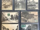 several old black and white photos of a street and buildings
