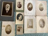 several old black and white photos of people on a blue blanket
