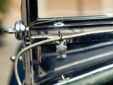 a close up view of a car ' s front door handle