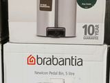 three boxes of brabantia coffee machines sitting on top of each other