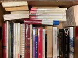 a box full of books that are sitting on a table