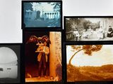 many pictures of a man and a woman on a wall