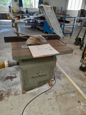 a picture of a workbench in a workshop with a lot of tools
