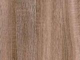 a close up view of a wood floor with a brown stain