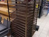 a lot of trays of food on the shelves in the store