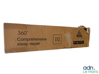 an image of a cardboard box that has a sticker on it