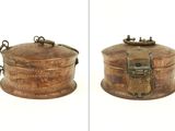 two pictures of a wooden box with a lock on it