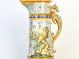 a large blue and white vase with a lion on it