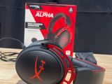 an image of a pair of headphones sitting on top of a wooden table