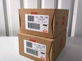 two boxes of boxes are stacked on top of each other