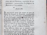 an old book with a black and white image on it