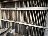 a room filled with lots of old wooden slats