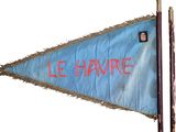 a blue pennant with the word ce honre written on it