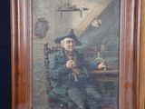 an oil painting of a man sitting in a chair in front of a blue background