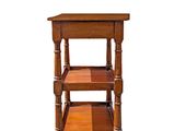 an image of a wooden table with three shelves on top of it