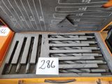 a lot of tools in a case on the table