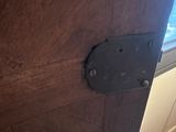 a close up of a wooden door with a latch on it