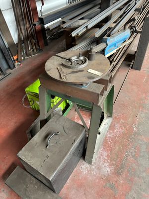 an image of a bench in a workshop with a lot of tools on it