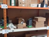 many boxes and packages on the shelves in the store