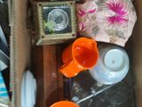 a box full of assorted items sitting on the floor