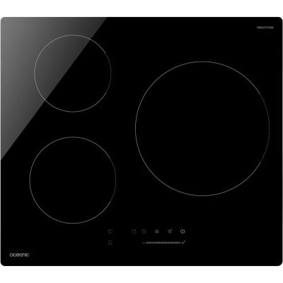 gros plan d'une cuisinière noire à trois brûleurs