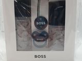 the boxed box contains two bottles of boss perfume and a bottle of cologne