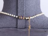 a close up of a necklace on a mannequin mannequin mannequin mannequin mannequin mannequin mannequin mannequin