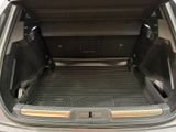 a trunk of a car with the back door open