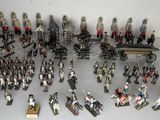 a lot of figurines that are sitting on a table