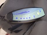 a cell phone on the seat of a motorcycle