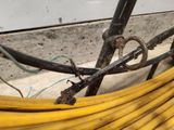 a close up of a bunch of wires on the ground
