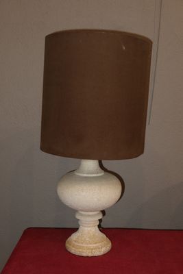a lamp that is sitting on a red table