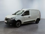 La camionnette blanche est garée dans une pièce au sol noir.
