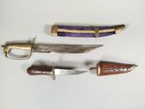 three different types of knives are displayed on a white surface