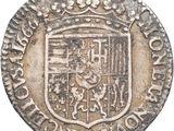 an old silver coin with a coat of arms on it
