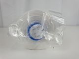 a close up of a roll of white tape wrapped in plastic