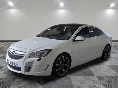 a picture of a white car in a showroom