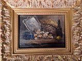 une photo d'un tableau représentant un miroir posé sur une table