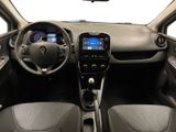 the interior of a small car with a steering wheel and dashboard