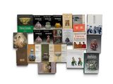 a lot of books that are sitting on a table
