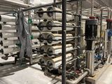 a large room with a bunch of pipes and pipes