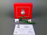 a red box with a green pepper next to it