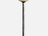 a close up of a lamp on a metal pole with a white ball
