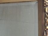 a picture of a mirror that is in a room