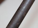 a close up of a metal pipe on a table