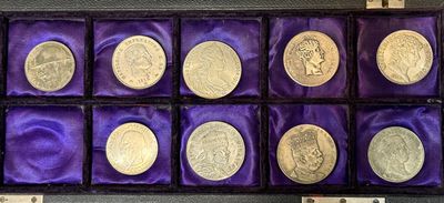 an image of a display case filled with different types of coins