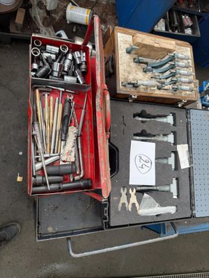a box of tools sitting on top of a table