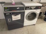 an image of a washing machine in a kitchen