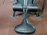 a machine that is sitting on the floor in the gym