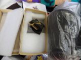 a small turtle inside of a box on a table